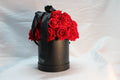 Caja con rosas rojas