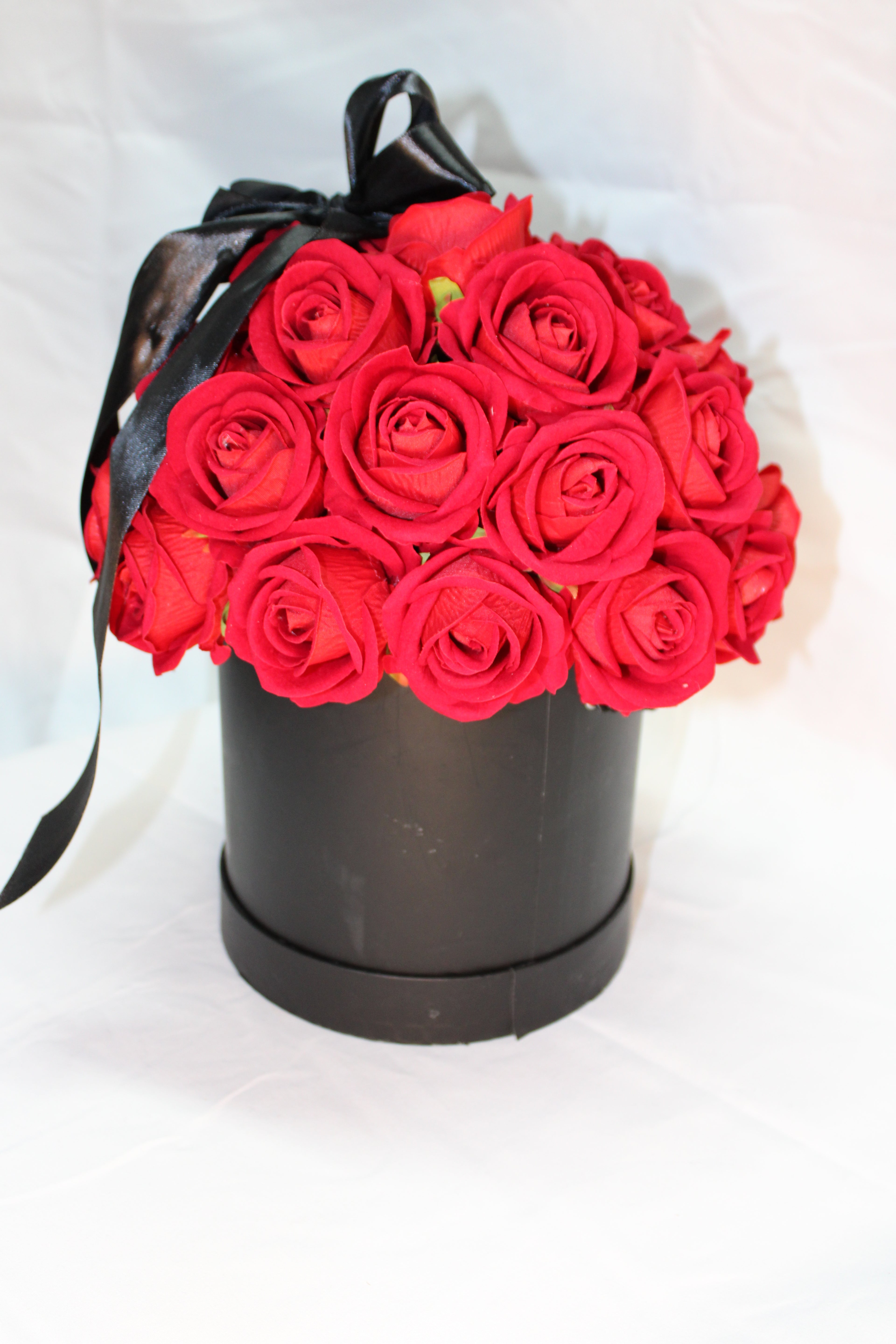 Caja con rosas rojas