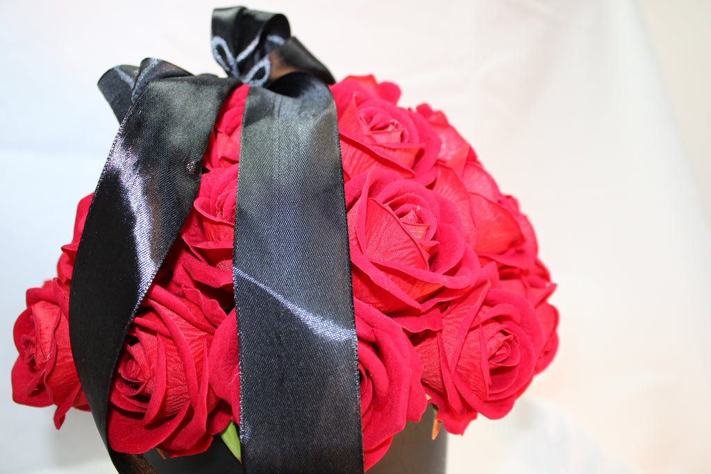 Caja con rosas rojas