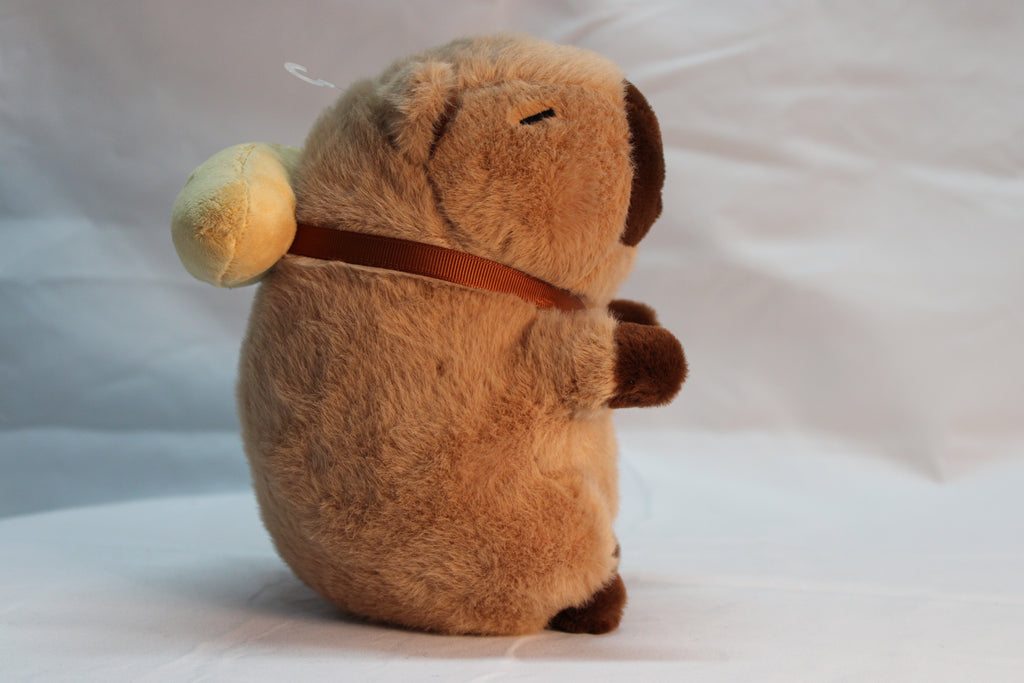 Peluche de capibara con mochila de pan