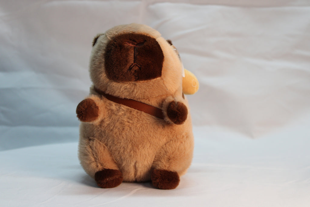 Peluche de capibara con mochila de pan
