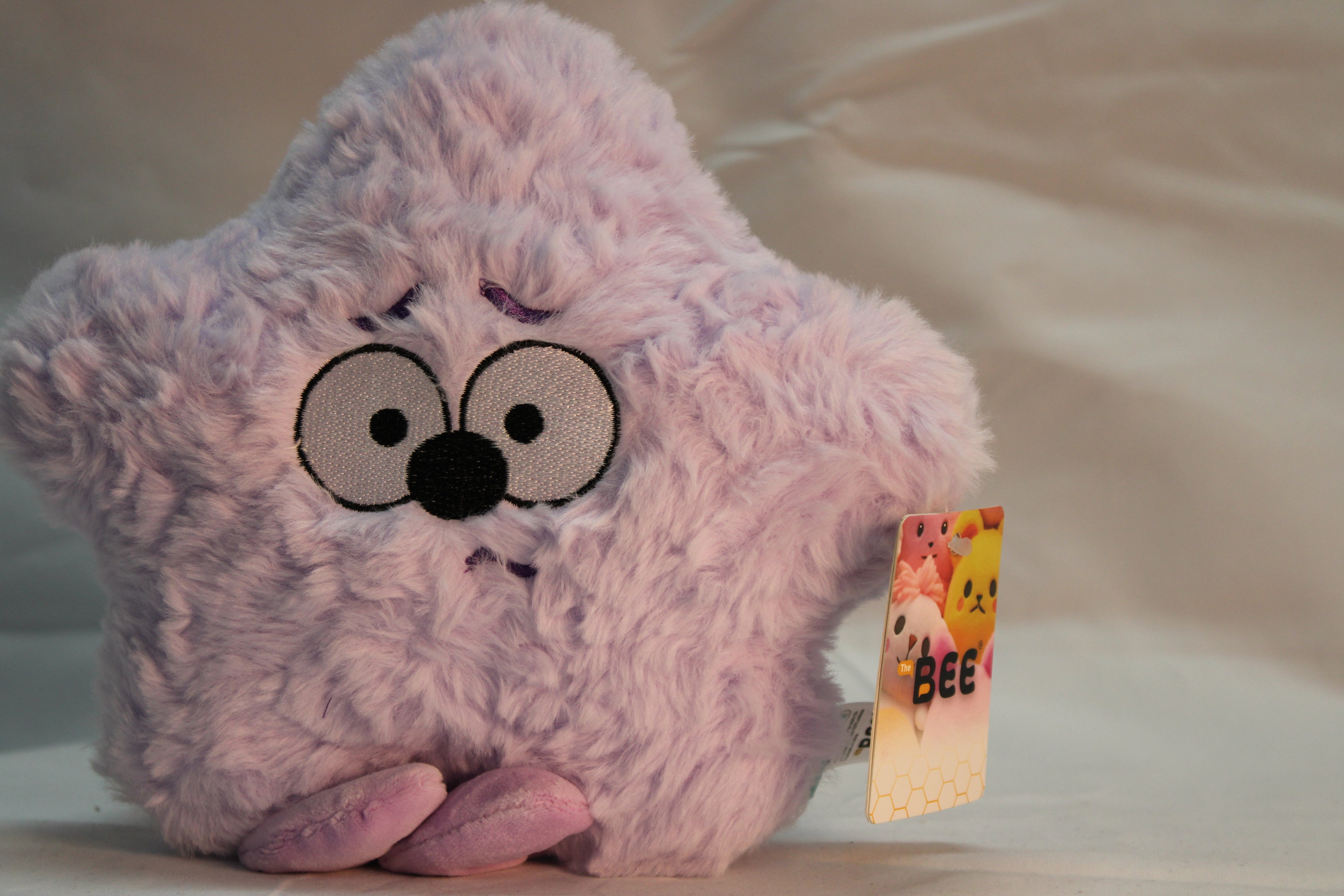 Peluche de estrella purpura