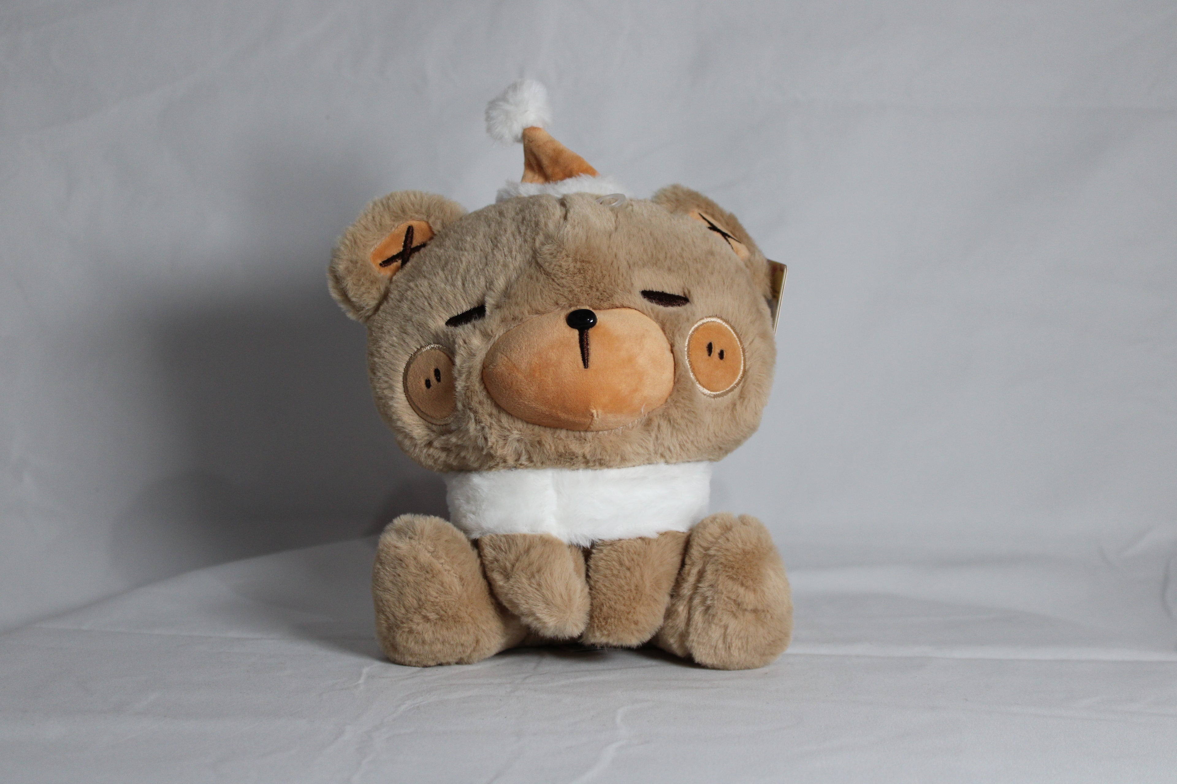 Peluche de oso marron con sombrero