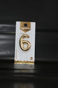 Vela dorada numero 6